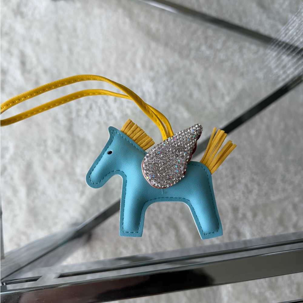 Blue Pony Wing Bag Charm with Yellow Tassels